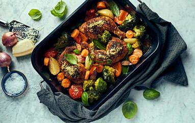 Oven-baked Chicken Legs with Vegetables and Parmesan