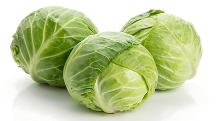 Fototapeta premium Fresh Green Cabbages on a White Background