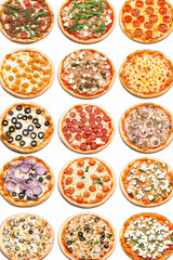 Bunte Auswahl an Pizzas mit verschiedenen Belägen auf einem Tisch

