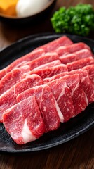 Freshly Sliced Premium Beef on Platter Garnished with Parsley for Culinary Use and Cooking Preparations