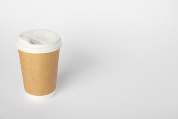 Paper cup with lid on white background. Mockup for design