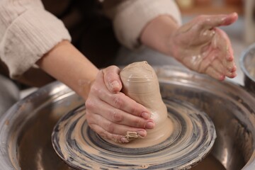 Hobby and craft. Woman making pottery indoors, closeup