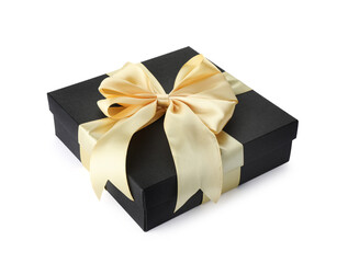 Gift box with golden bow isolated on white