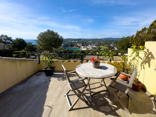 Relaxing terrace overlooking picturesque llafranc on the costa brava, spain