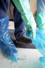 Professional Pest Control Technician Spraying Exterior Foundation for Infestation Prevention