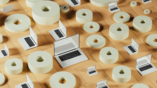 Futuristic technology setup with laptop and abstract geometric shapes