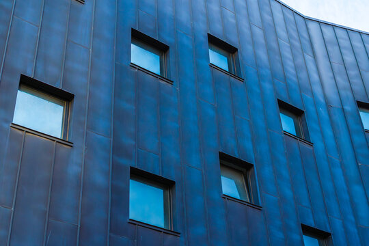 Modern multicolored facade with distinctive windows