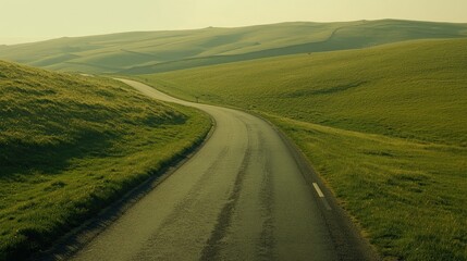 Serene Countryside Road Winding Through Rolling Hills