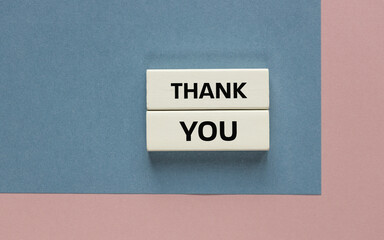 Thank you symbol. Gray wooden blocks with the words Thank you.  Simple words. Appreciation of work...