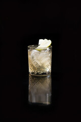 Apple cocktail on a black background.