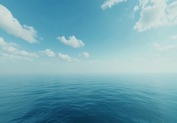 Obraz premium Calm Ocean View Under Blue Sky with Soft Clouds and Tranquil Water Reflection Creating a Serene Atmosphere for Relaxation or Inspiration