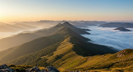 A soft-focus landscape of misty peaks, beautifully captured in the calm of early morning.