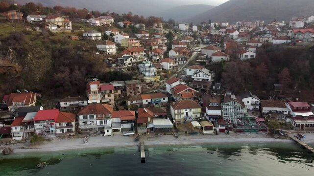 Aerial View of Trpejca Village on Lake Ohrid, North Macedonia on a Cloudy Autumn Day