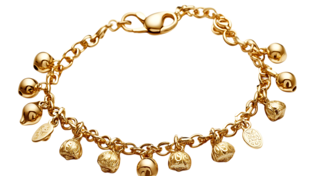 Gold charm bracelet with small bells and pendants.