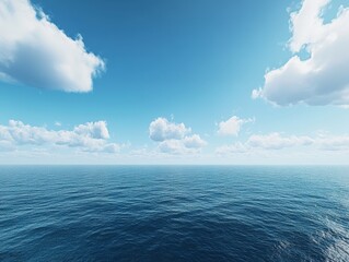 Fototapeta premium Expansive View of Crystal Blue Ocean Under Clear Sky with Soft White Clouds Emphasizing Tranquility and Natural Beauty of Seascape