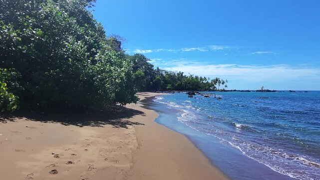A drone shot of a beautiful beach at Playa San Josecito, Costa Rica on Drake's Bay Trail / Bahia Drake