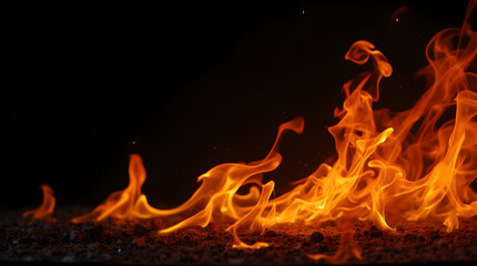 Vibrant Hot Fiery Orange Yellow Flames Dark Ground Close-Up