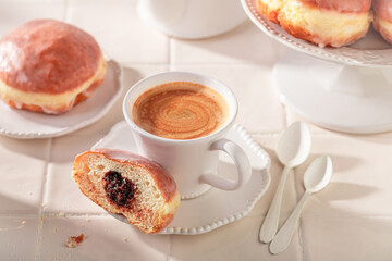 Traditionally doughnuts made of marmalade and flour.