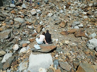 Rocks of assorted sizes and colors ranging from light gray to rust-brown.