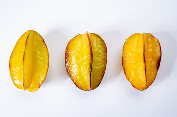 Ripe fresh averrhoa carambola or star fruits on white background