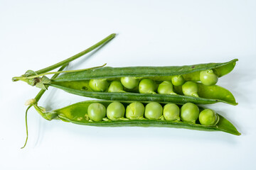 New harvest of fresh ripe green peas legumes