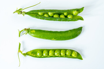 New harvest of fresh ripe green peas legumes