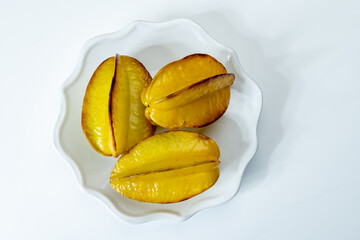 Ripe fresh averrhoa carambola or star fruits on board