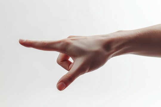A delicate female hand reaching out with a gentle finger gesture against a light background.