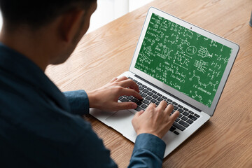 Mathematic equations and modish formula on computer screen showing concept of science and education