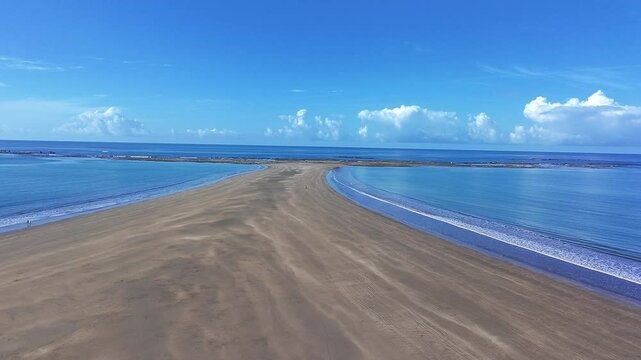 Flying shot of the Uvita Whale Tail on Costa Rica&rsquo;s Pacific coast along the shoreline