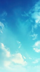 Bright blue sky with fluffy clouds during midday in a serene atmosphere