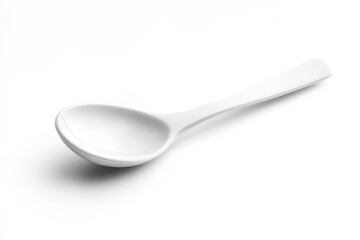 A simple white spoon resting on a smooth surface, illuminating minimalist kitchen elegance isolated on transparent background