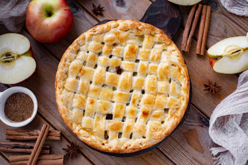 Apple pie for breakfast. Apple and cinnamon pie for dessert. View from above. Close-up