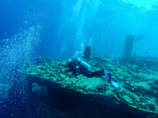 scuba diver and the wreck in the Red Sea