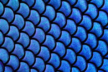 Iridescent deep blue mermaid scale textile pattern background © Damian Pawlos