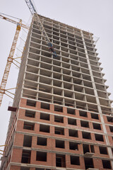 Urban Construction A Modern Building is Under Development in the Cityscape Area Nearby