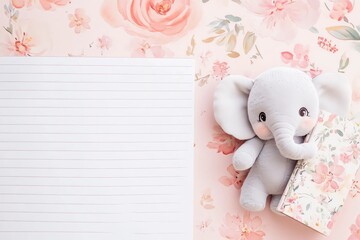 Obraz premium Children's ruled stationery pages in muted pink color with a cute little elephant