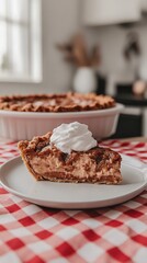 Slice of pie with whipped cream on the table