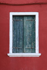 Typical renaissance window in Burano, Italy