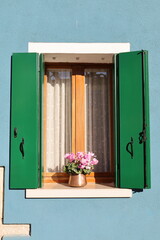 Typical renaissance window in Burano, Italy