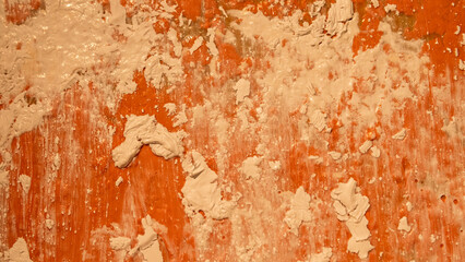 Detail of cream and orange paint texture