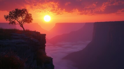 Sunrise over canyon clifftop with lone tree
