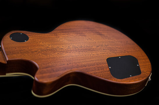 Close-up of a classic Goldtop guitar with P90 pickups, showcasing its vintage design, warm tones, and iconic single-cutaway body. Perfect for blues, rock, and jazz themes with a timeless aesthetic