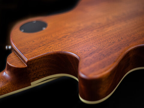 Close-up of a classic Goldtop guitar with P90 pickups, showcasing its vintage design, warm tones, and iconic single-cutaway body. Perfect for blues, rock, and jazz themes with a timeless aesthetic