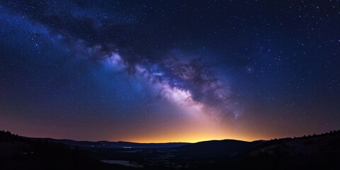 Fototapeta premium Stunning view of the Milky Way galaxy over a serene landscape at night with glowing horizon and star-filled sky