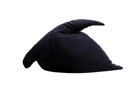 A whimsical black pillow in a quirky shape resting on a bright background captures playful comfort isolated on transparent background