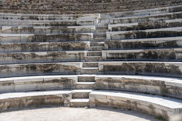 Steps leading between the marble terrace seats in Roman Odeon amphitheater