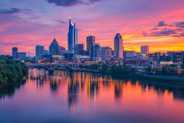 Obraz premium Stunning Nashville Skyline at Sunset Vibrant Colors Beautiful Cityscape Dramatic Sky Urban Landscape Breathtaking View Modern Architecture River 