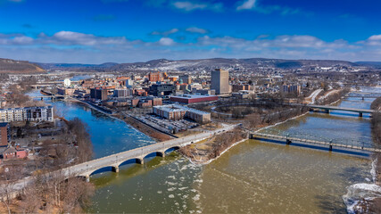 Binghamton, NY, USA - 03-02-2025: Winter afternoon aerial photo over downtown Binghamton, NY.