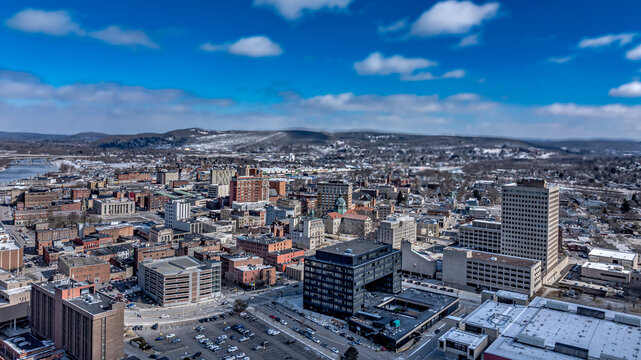 Binghamton, NY, USA - 03-02-2025: Winter afternoon aerial photo over downtown Binghamton, NY.